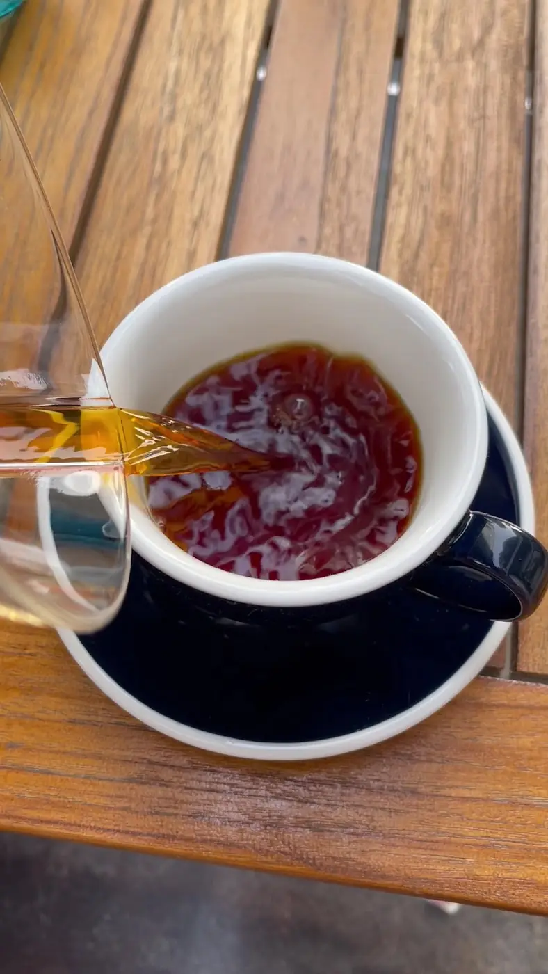 Tea being poured at Autograph Deli