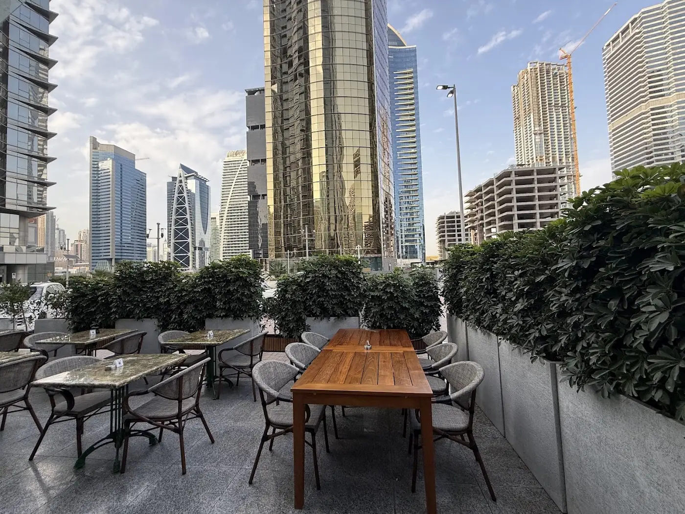 Autograph Deli's terrace seating under the JLT towers
